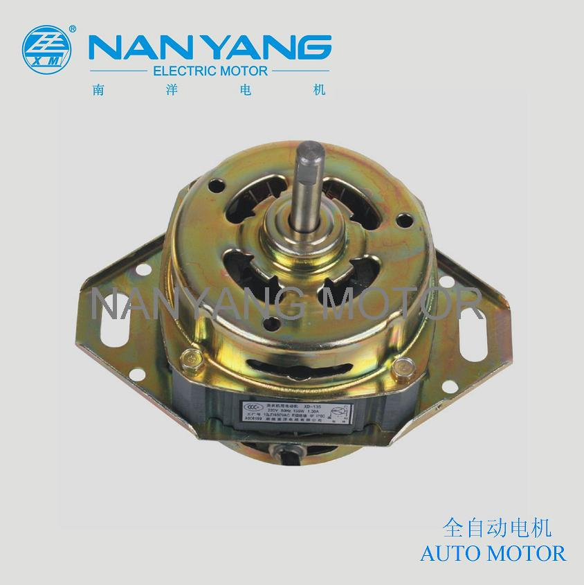 Fully automatic washing machine motor showing its metal rating plate on the housing