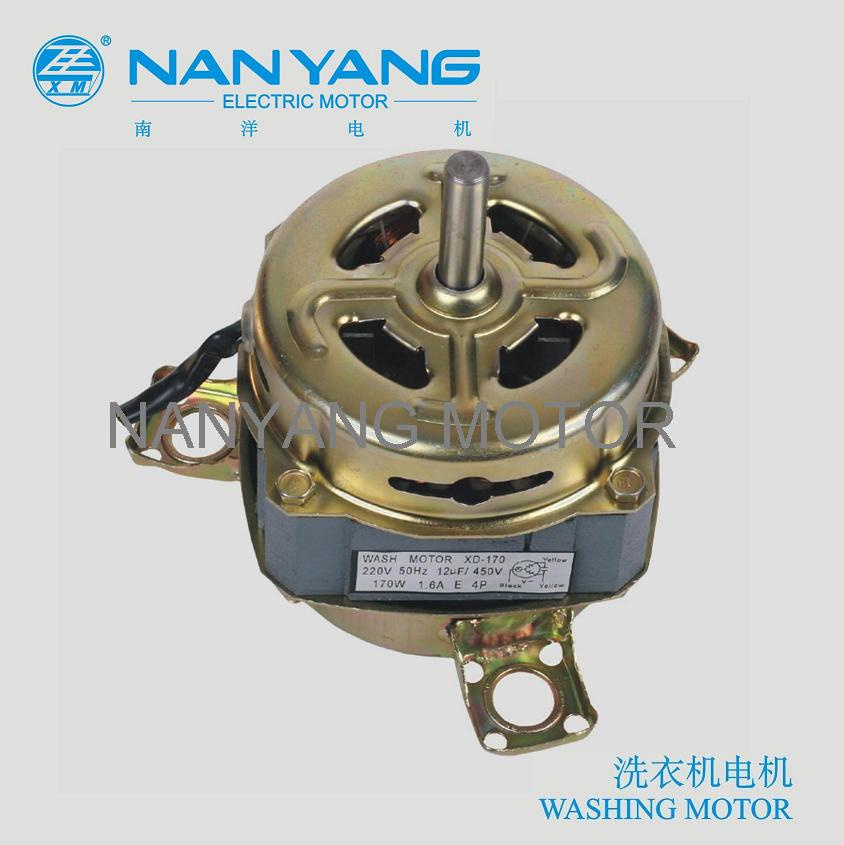 Single-phase washing motor in side view, showing its rating plate and lead wires